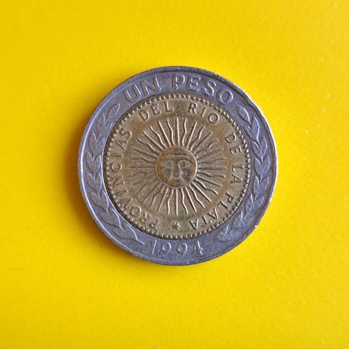 Peso münze aus - 1,